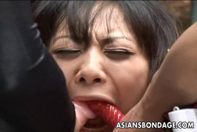Two horny Asian girls dominate their bound submissive slave bitch - bdsm.one