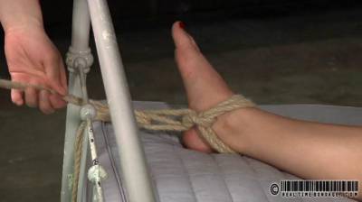 Slutty slave tied up to a bed and whipped BDSM - bdsm.one