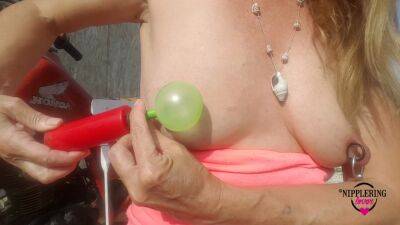 Nippleringlover Horny Milf Sticking Balloons Through Extreme Stretched Pierced Nipples Outdoors - hclips.com