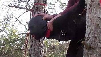 Tied up to a tree outdoor on sexy clothes, wearing pantyhose and high ankle boots heels, rough fuck - xvideos.com