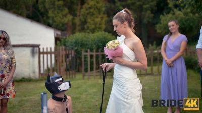 Perverted hot bride gets fucked by a masked sex slave on a leash during a wedding ceremony - anysex.com